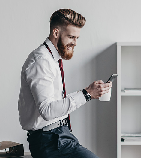 businessman-using-smartphone amssolutions